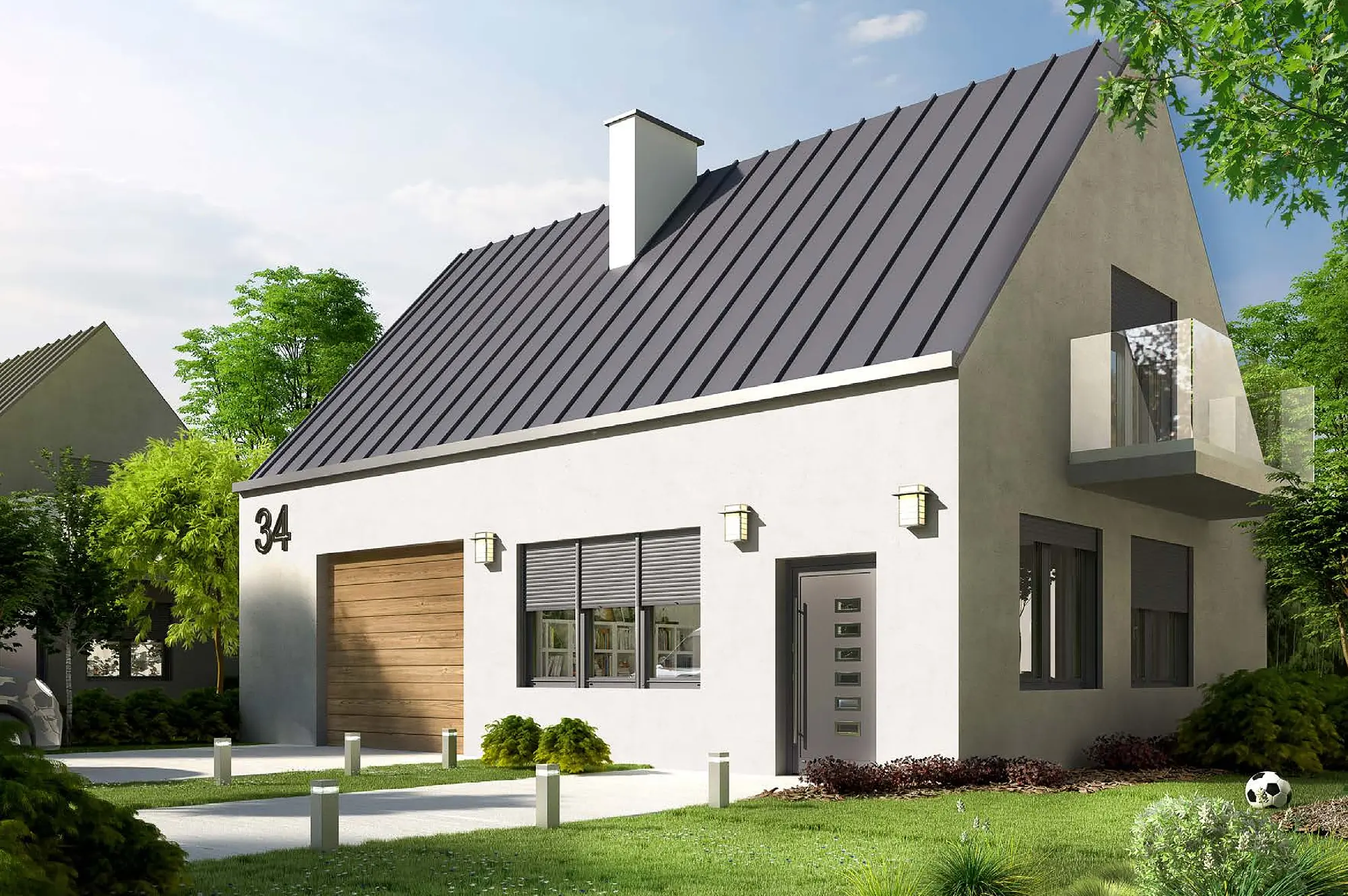 Einfamilienhaus mit steilem, dunklem Satteldach, heller Putzfassade und anthrazitfarbenen Fenstern