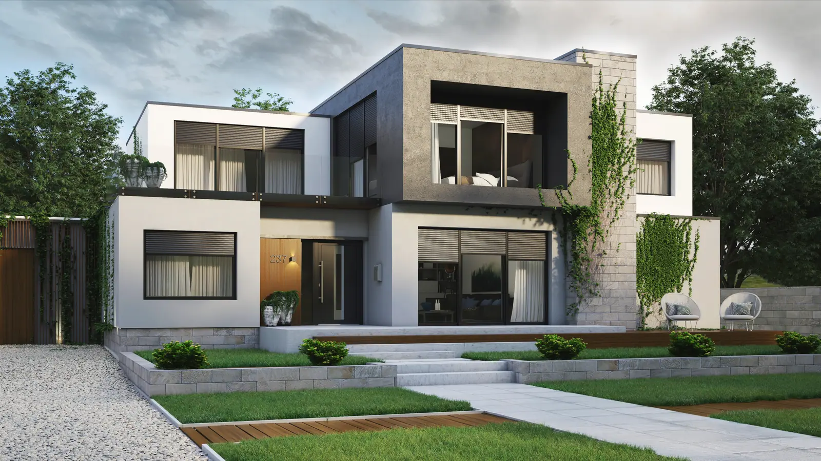 Modernes Wohnhaus mit Unterputz-Rollläden in Anthrazit und einer Haustür aus dem System Iglo Energy